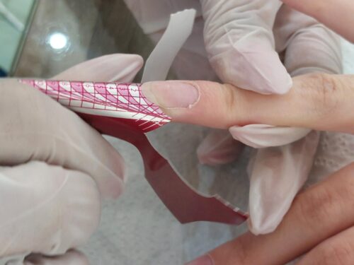 Professional manicure with nail repair